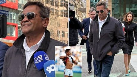 Footy legend Nicky Winmar fronts court accused of two assaults and choking a person - all on the same day