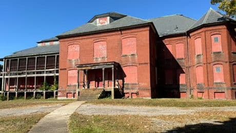 'Sinister' abandoned asylum filled with shoes of patients who were experimented on