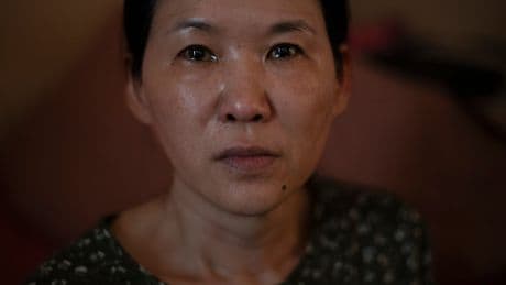 Woman seeks compensation from South Korea over her forced adoption to France in 1984