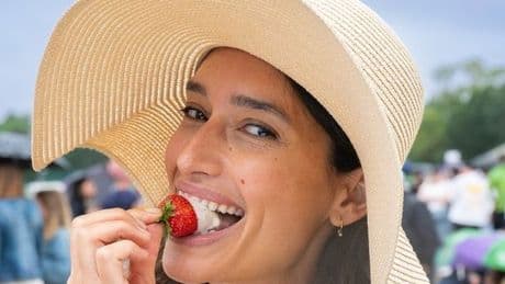Wimbledon spectator slammed as she's caught dipping strawberries in 'gross' sauce
