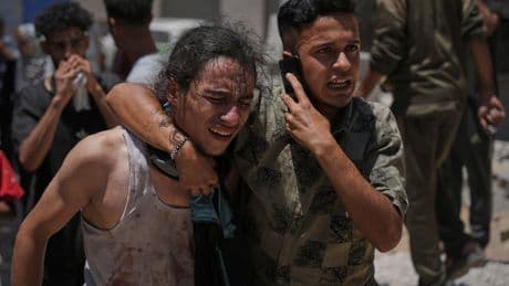 Photos show Gaza's deadliest day for Palestinians looking for food after more than 80 are killed