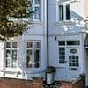 How houses belonging to notorious killers flew off the market after grim murders...but which lair was the most expensive?