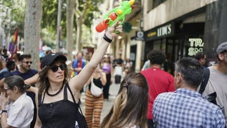 Spanish locals shoot water at visitors in protests against mass tourism