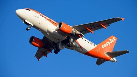 EasyJet flight chaos as passenger grabs plane door & screams ‘bomb’ on flight to Manchester forcing emergency landing