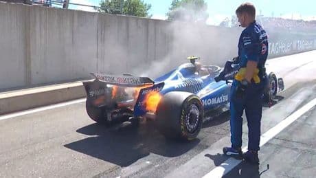 Carlos Sainz’s car catches fire as Austrian Grand Prix descends into chaos on formation lap