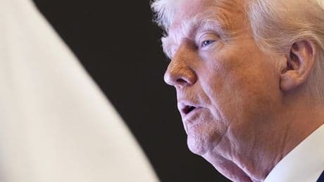 Trump, on way back from Mideast, attacks celebrities