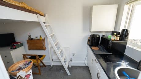 UK’s ‘SMALLEST flat’ in janitor’s cupboard costs eye-watering £250k… as owner jokes ‘at least I don’t have a girlfriend’