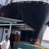 Terrifying moment out-of-control 700ft cargo ship crunches into Suez Canal port as workers run for their lives