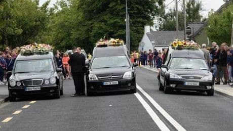Hundreds gather for funeral of murdered mother and children 'together and finally safe'
