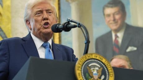 Trump says he won't fire Fed chief, signals lowering of China tariffs