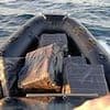 Incredible moment boat with £18m of cocaine crashes onto beach after being chased for 28 miles at sea by 'Britain's FBI'