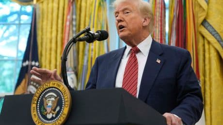 The Latest: UK says trade deal slashes tariffs on cars, steel and aluminum