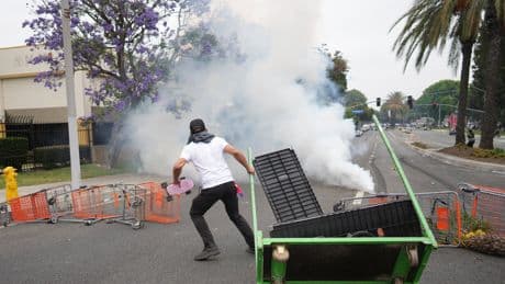 AP PHOTOS: Protesters tear-gassed in Los Angeles after federal immigration arrests