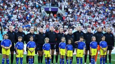 England players refuse to take knee and stand up in message about racist abuse