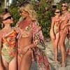 Billie Faiers flaunts her jaw-dropping figure in a stylish floral bikini as she poses with her mini-me daughter Nelly, 10, during family holiday in Dubai