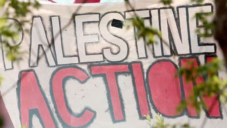 More than 60 people charged with supporting Palestine Action