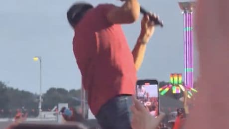 Luke Bryan gets nailed in the face by flying object while performing at state fair