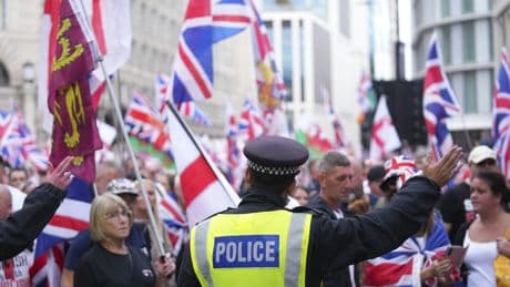 Thousands march in London in support of far-right activist Tommy Robinson