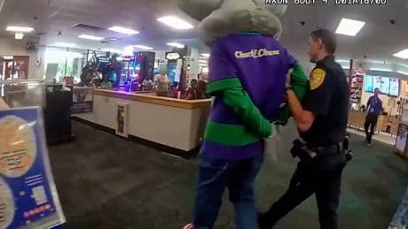 Moment Chuck E Cheese is put in handcuffs in front of kids ‘for stealing customer’s credit card’