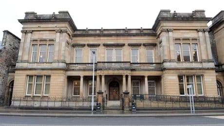 Boozed-up Neilston man fined for racial remark to neighbour after row