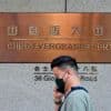 China Evergrande to be delisted from Hong Kong stock exchange following debt woes