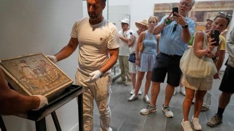 Erotic Roman mosaic stolen by Nazis during Second World War returns to Pompeii