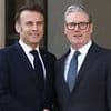 Hand back our £771MILLION Mr Macron.. s'il vous plait: French President to face questions over his country's failure to dent small boat crisis as he arrives in Britain