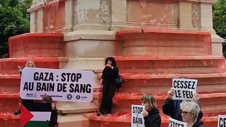 Blood-red water pours down Paris fountain in pro-Palestine protest