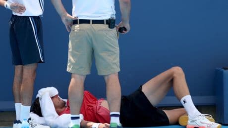 Tennis star collapses on court due to heat in worrying scenes before being forced to retire at Cincinnati Open