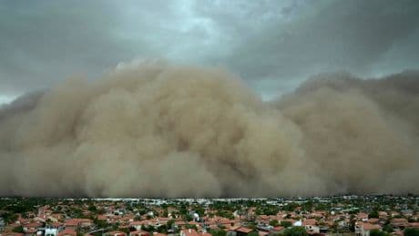 Towering wall of dust rolls through metro Phoenix, leaving tens of thousands without power