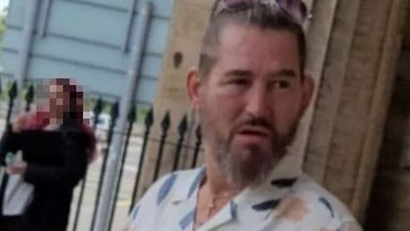 Raging neighbour threw pants in police officer's face after bust up in street