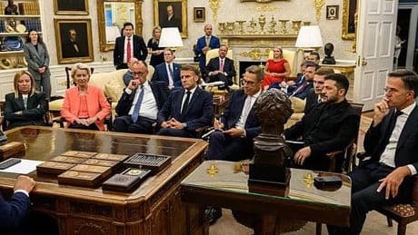 The Donald holds court: Photo of European leaders gathered around Trump's desk 'like obedient school children' that sums up Ukraine summit