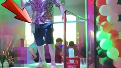 Shock moment Brit police officer exposes himself & wees on Benidorm bar on boozy holiday before being suspended by force