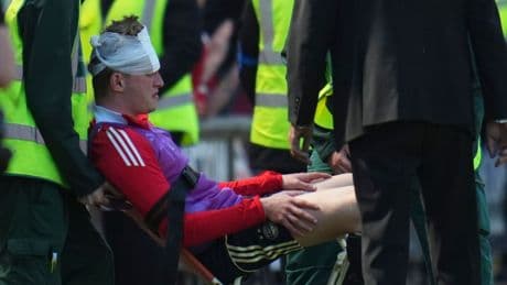 Shock moment Aberdeen star requires medical treatment after being hit by seat thrown from OWN FANS after pitch invasion