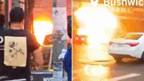 Moment manhole shoots fire onto street as terrified pedestrians run