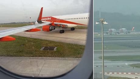 Airport chaos hits Britain yet again as planes 'clip wings' at Manchester Airport and stop ALL flights