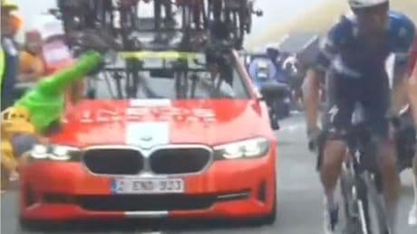 Ineos apologise after hitting spectator with support car during Tour de France