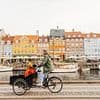 Why IS Denmark one of the happiest places on earth? As figures show incredible success of country's strict migration rules… could the two be linked?
