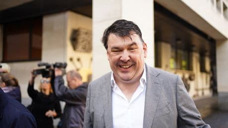 Graham Linehan arrives at court to face trial accused of harassing trans woman