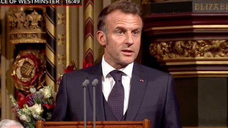 Britain and France must shoulder burden of keeping Europe safe, Macron says in historic parliament address