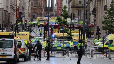 Liverpool parade incident as man detained after car 'driven into crowds'