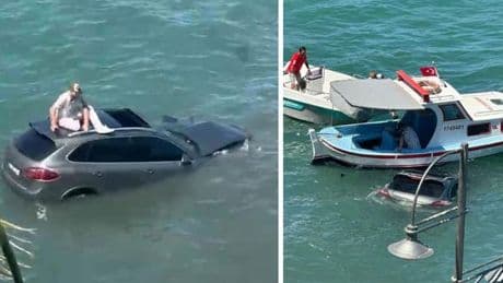 Ayvalık'ta otomobil denize uçtu: Sürücüsü üzerinde dakikalarca kurtarılmayı bekledi