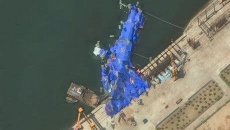 North Korea detains 3 officials following botched warship launch, state media says