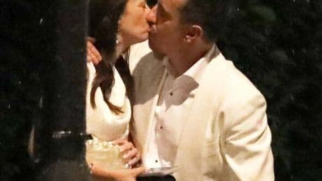 Gary Neville looks worse for wear and snogs wife after leaving David Beckham bash