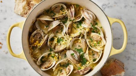 Crème fraîche creates a creamy broth in this recipe for briny-sweet steamed clams