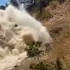 Shocking moment pipe explodes near Brit tourists' balconies sending torrent of water through Costa Del Sol resort and turning sea brown