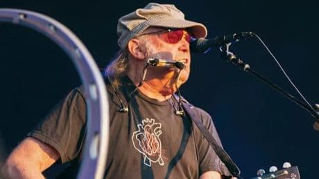 Inside Neil Young's tour - supermodels, Hollywood A-listers and games on rider