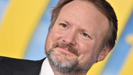 Netflix's Ted Sarandos called seeing movies in theaters 'outdated.' Rian Johnson wants his next 'Knives Out' movie in as many as possible.