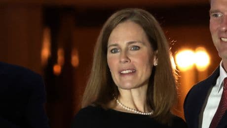 Barrett says justices 'wear black, not red or blue' in response to partisan critics in Fox News interview