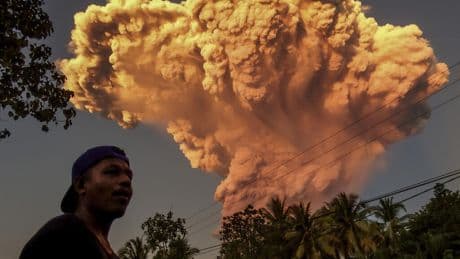 Dozens of Bali flights cancelled after Indonesia volcano erupts